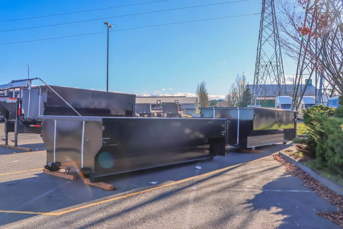 Roll-off dumpster ready for waste disposal at job site for 12 Yard Dumpster Rental in Warwick